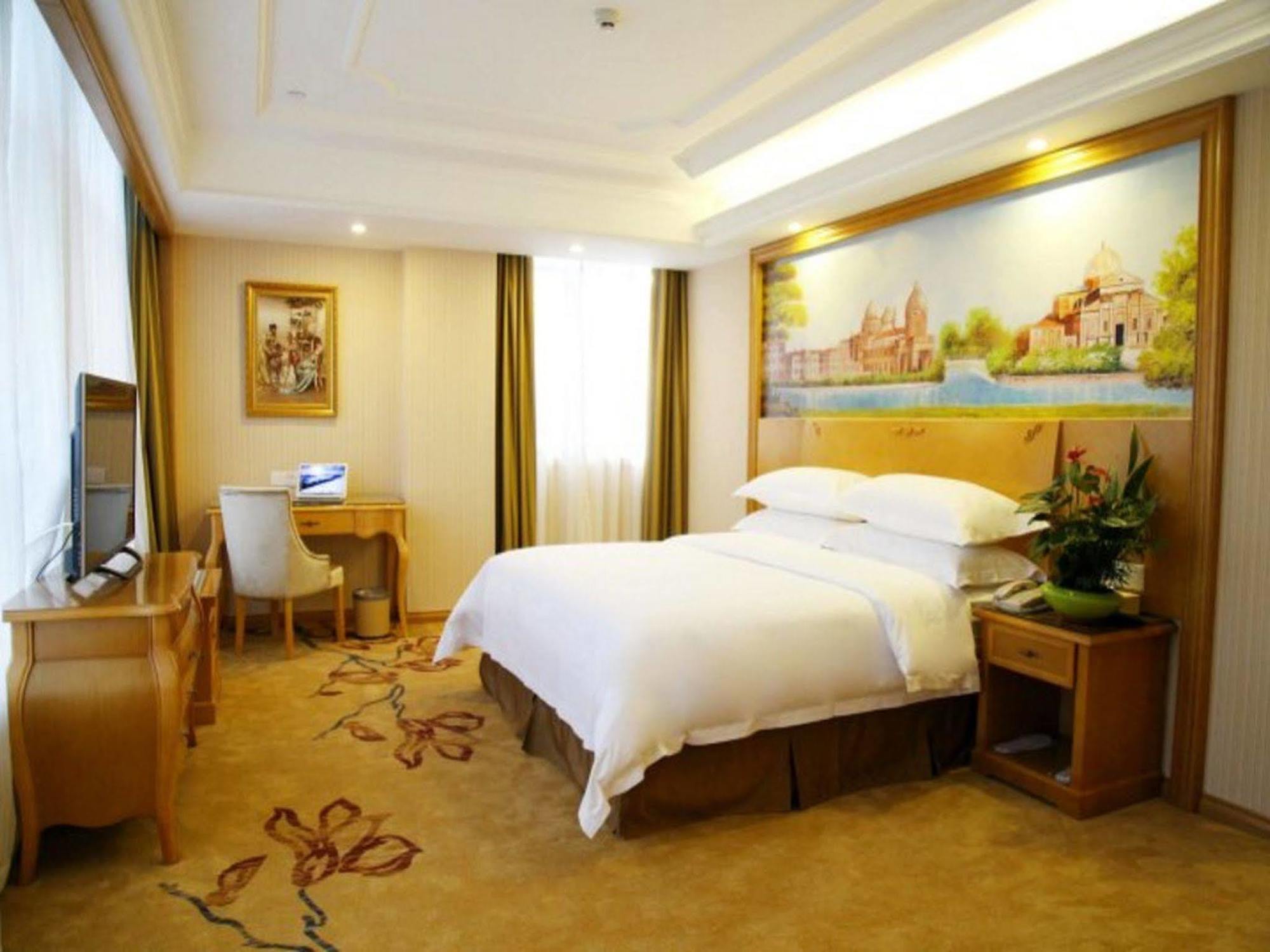 Vienna International Hotel Meizhou Spindle Bridge Branch Buitenkant foto